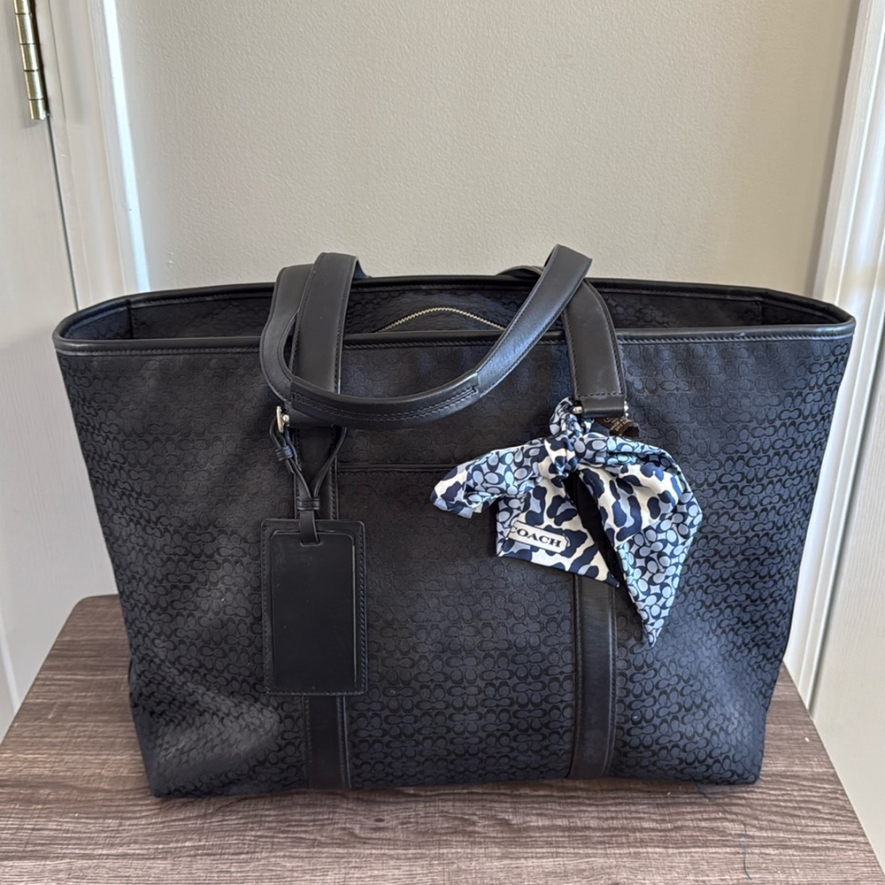 Coach Mini Signature “C” Weekender Bag in black